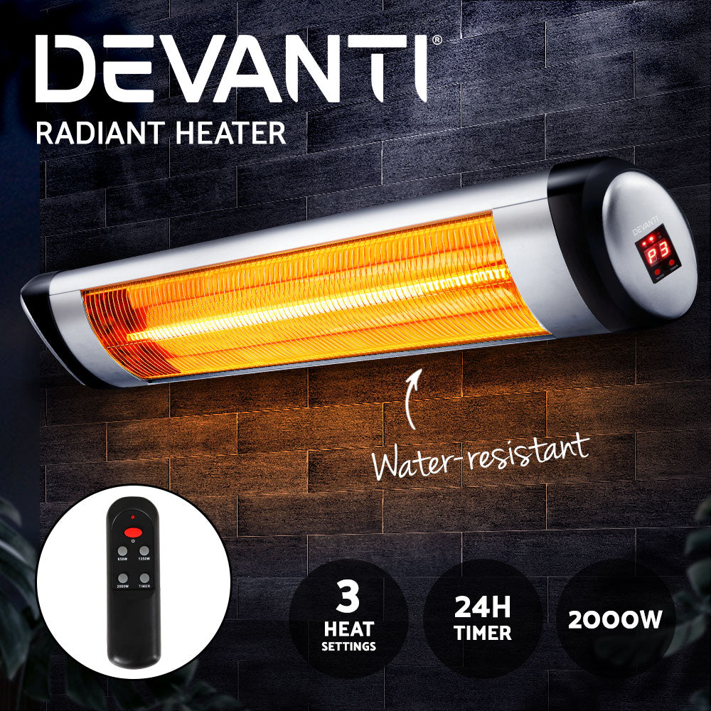 Wall mounted Devanti 2000w quartz radiant bar heater glowing red with a remote control unit.
