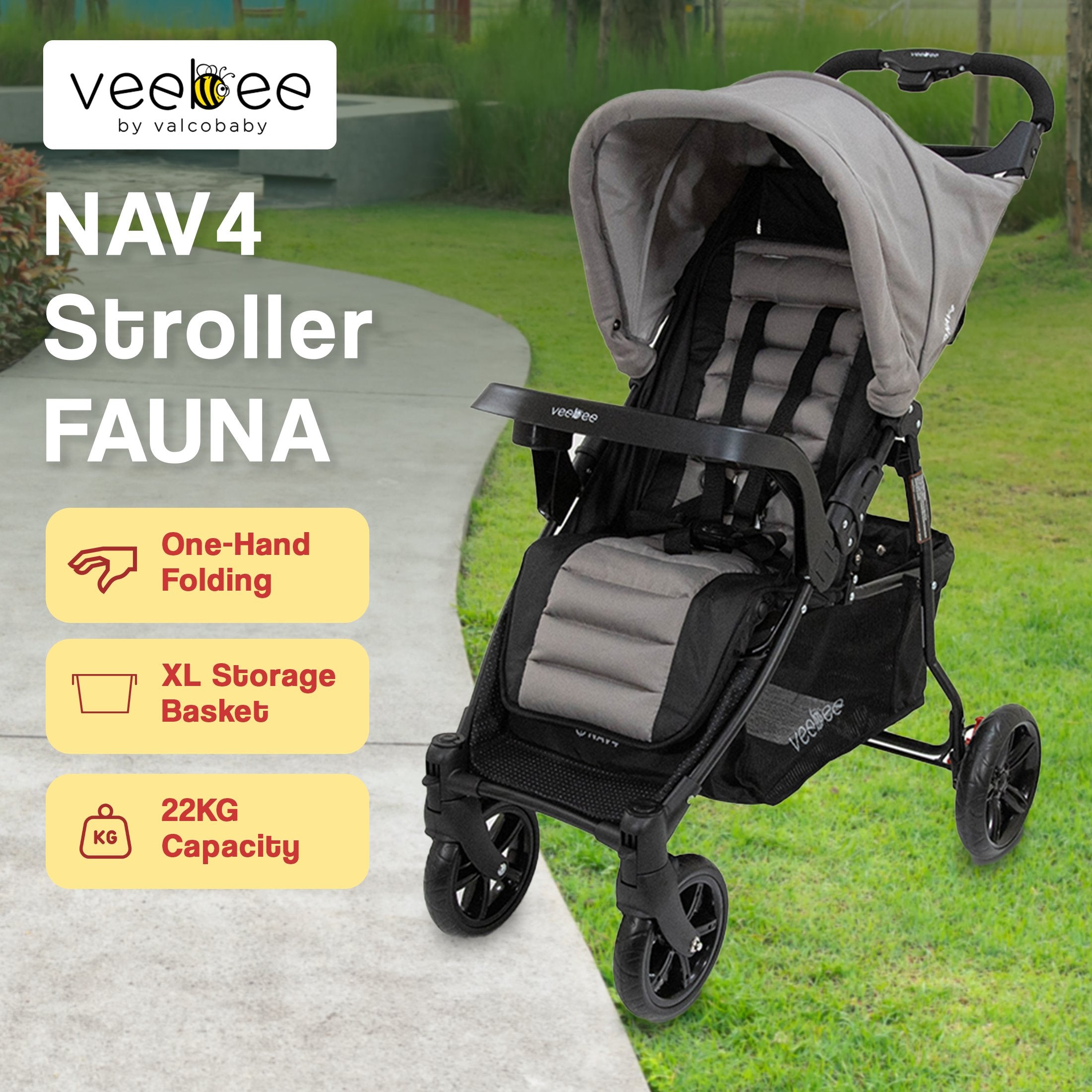 Veebee Nav 4 Stroller Fauna in stylish black and grey  colour with hood and carry basket 22kg capacity with a lawn and concrete path background.