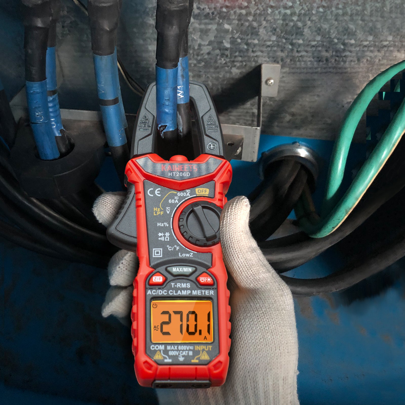 A red bodied black clamp AC-DC Tong tester clamp meter testing cables showing 270 amps 